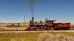 UP 119 doing a run-by on a separate track put in for this purpose.  Jupiter sits back at the Golden Spike site on the original track alignment.